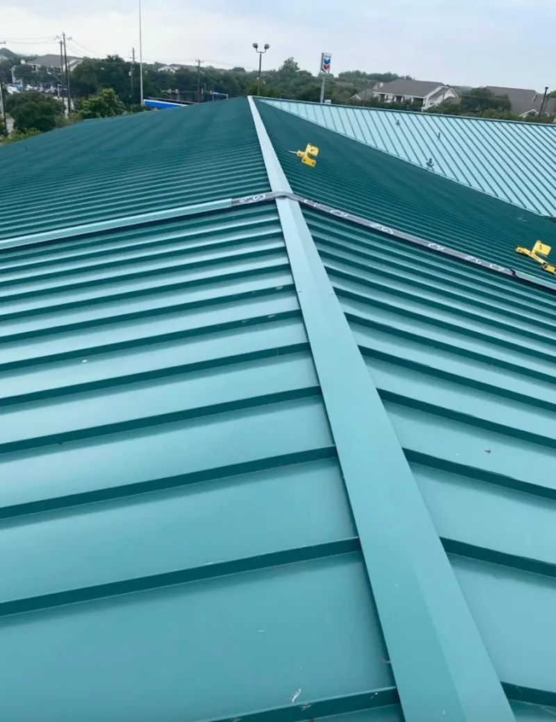 Green commercial metal roof ridge and valley for Metal Roof Repair in East Brandywine