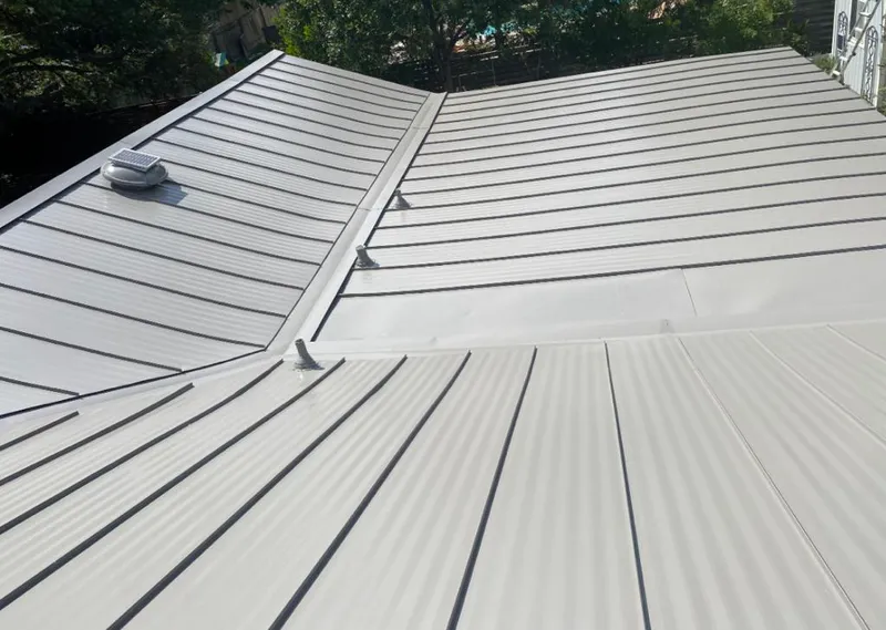 Solar attic fan installed on a metal roof for Roof Ventilation in East Brandywine